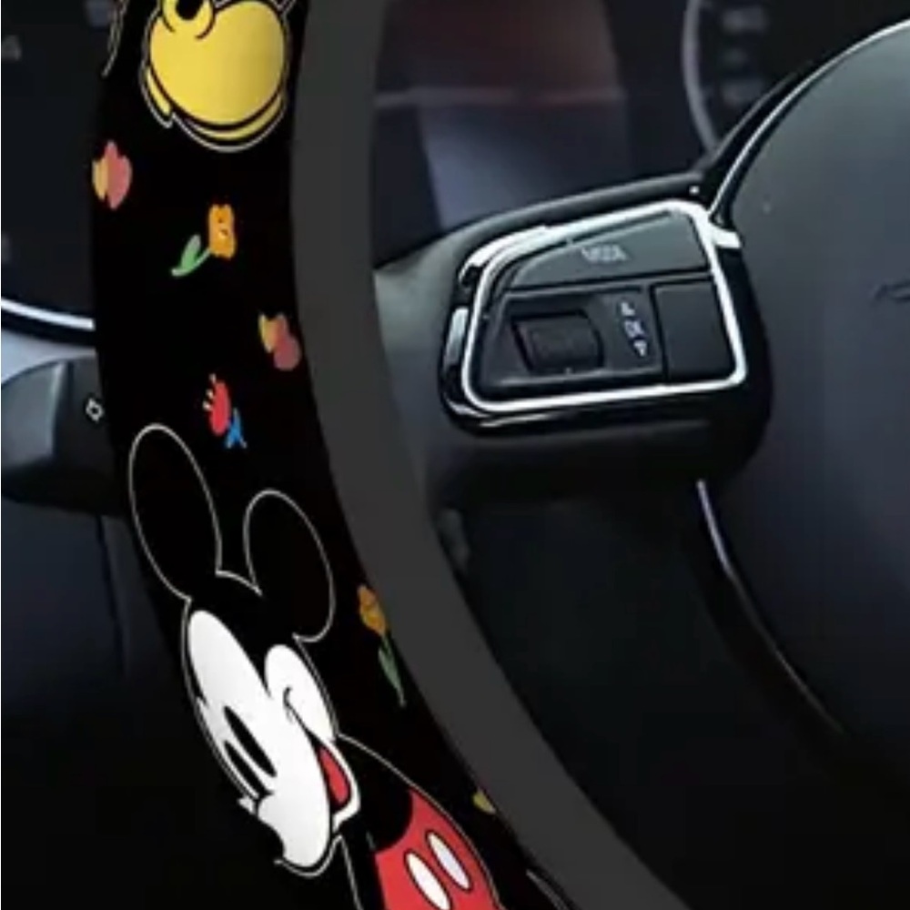 Disney Mickey Mouse Black Steering Wheel Cover black background
